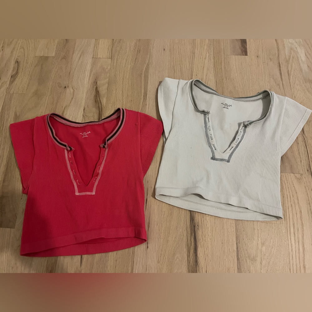 Two Urban Outfitters out from under go for gold seamless tops in ivory and pink